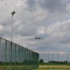 Budowa słupów oświetleniowych na potrzeby boiska treningowego do gry w piłkę nożną przy ZSP w Rzą