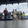 Zdjęcie przedstawia uczestników biegu dożynkowego