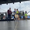 Zdjęcie przedstawia uczestników biegu dożynkowego