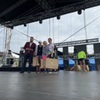 Zdjęcie przedstawia dekorację uczestników biegu dożynkowego