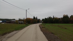 Wbudowanie podbudowy na odcinku od km 0+692 do km 1+677.