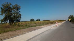 Wbudowanie oporników i podbudowy ścieżki rowerowej wzdłuż drogi gminnej w m. Ośno.