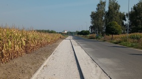 Wbudowanie oporników i podbudowy ścieżki rowerowej wzdłuż drogi gminnej w m. Ośno.