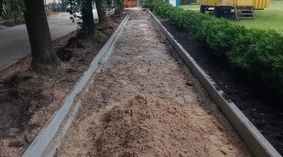 Wbudowanie obrzeży chodnikowych na odcinku od km 0+100 do km 0+150