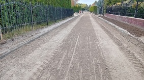 Wbudowanie podbudowy i warstwy mrozoochronnej z mieszanki związanej cementem na ul. Storczykowej.