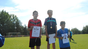 zwycięzcy na podium
